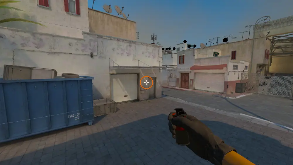 Standing on the Long Doors spot on Dust2, the aim mark on the point this molotov is thrown at.