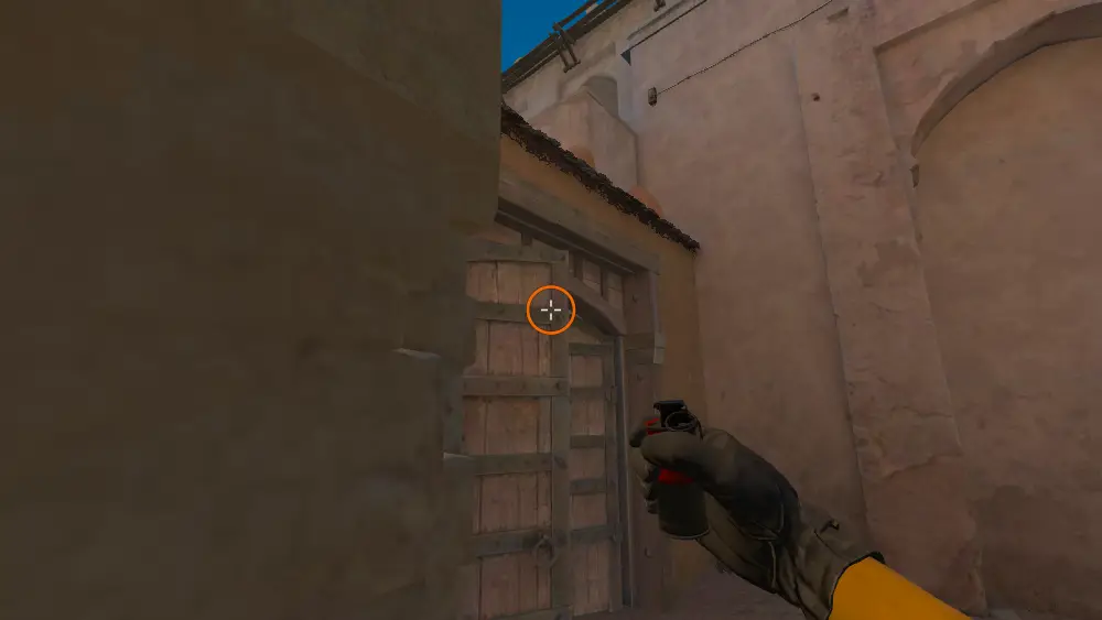 Standing on the Mid Doors spot on Dust2, the aim mark on the point this molotov is thrown at.