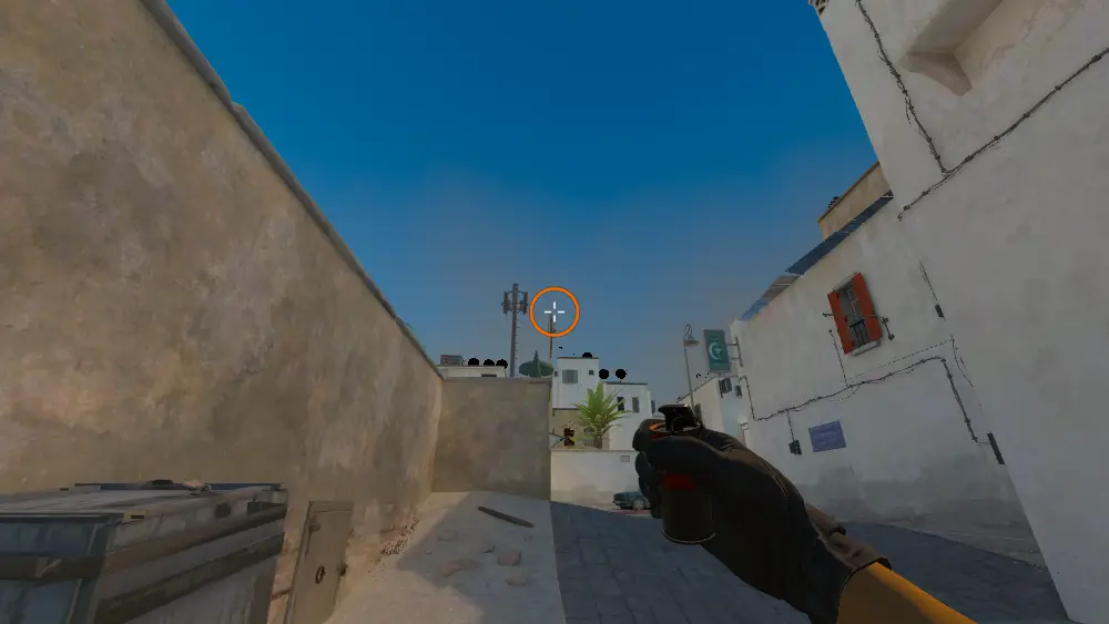Standing on the Dust2 spot on Dust2, the aim mark on the point this smoke is thrown at.
