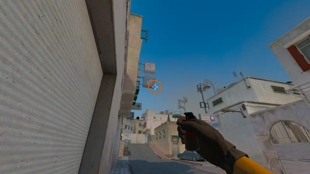 Standing on the Corner spot on Dust2, the aim mark on the point this flash is thrown at.