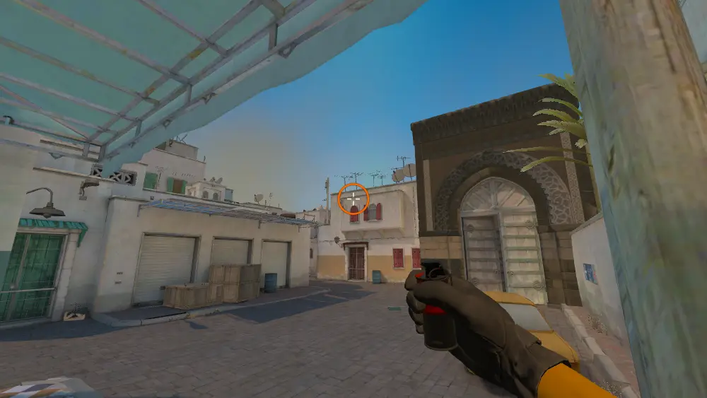 Standing on the Outside Long spot on Dust2, the aim mark on the point this smoke is thrown at.