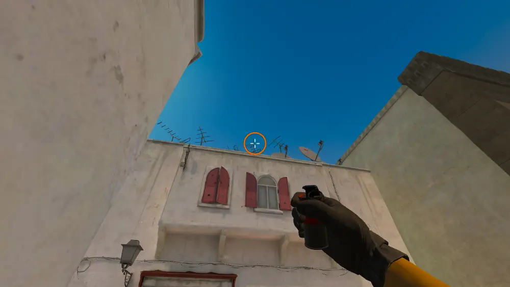 Standing on the Top Mid spot on Dust2, the aim mark on the point this smoke is thrown at.