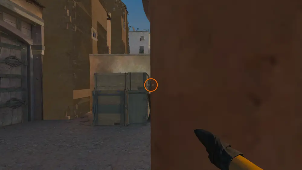 Standing on the Lower Tunnel spot on Dust2, the aim mark on the point this smoke is thrown at.