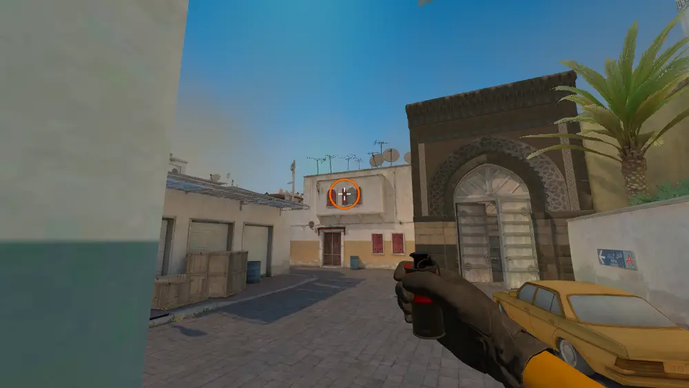 Standing on the Outside Long spot on Dust2, the aim mark on the point this smoke is thrown at.