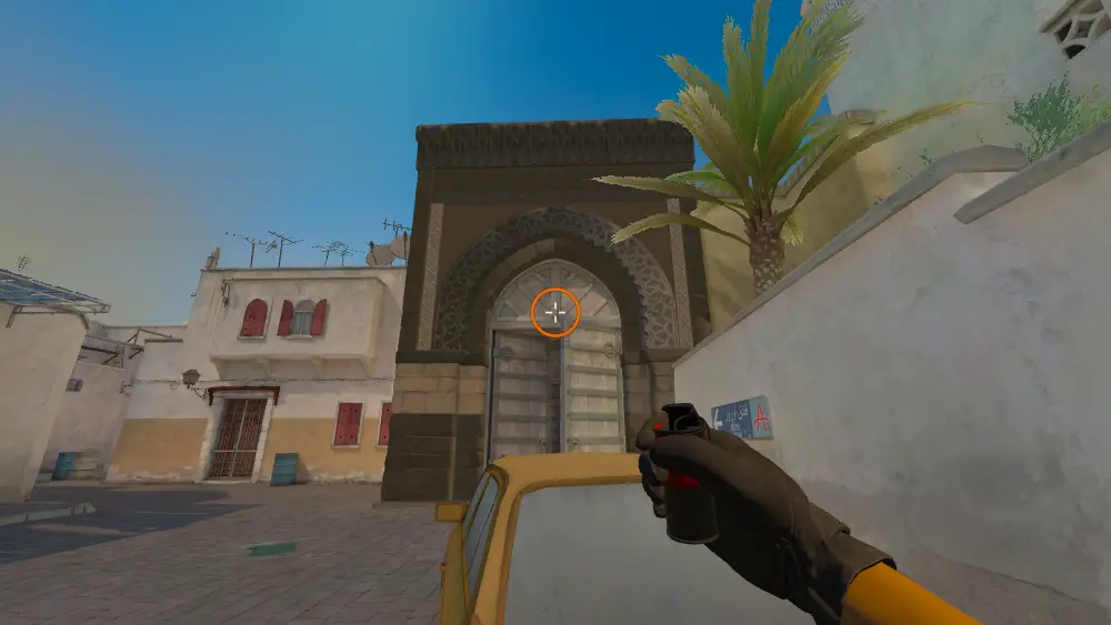 Standing on the Outside Long spot on Dust2, the aim mark on the point this flash is thrown at.