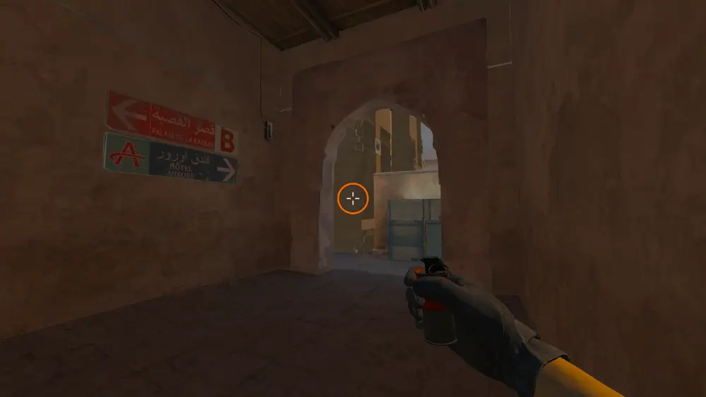 Standing on the Lower Tunnels spot on Dust2, the aim mark on the point this molotov is thrown at.