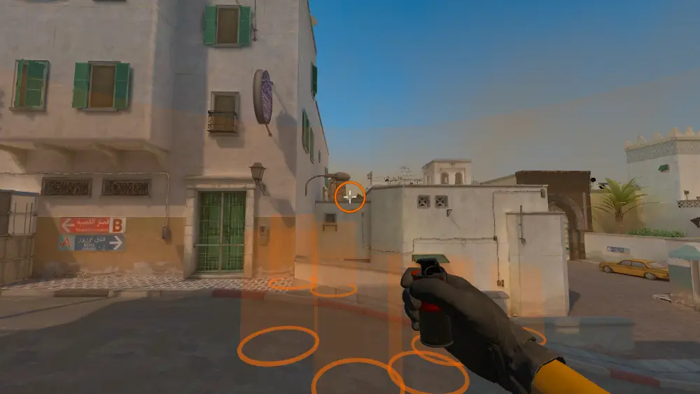 Standing on the T Spawn Railing spot on Dust2, the aim mark on the point this smoke is thrown at.