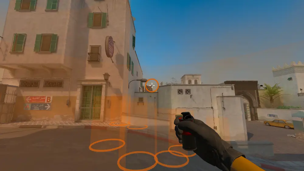 Standing on the T Spawn1 spot on Dust2, the aim mark on the point this smoke is thrown at.