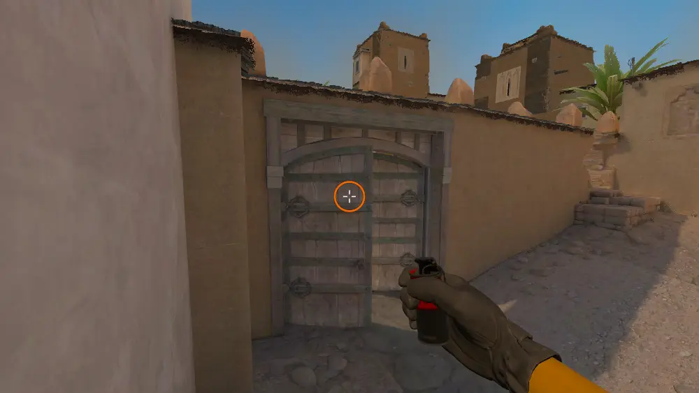 Standing on the B Doors spot on Dust2, the aim mark on the point this molotov is thrown at.