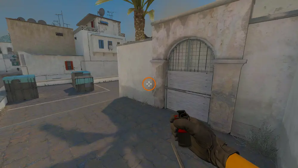 Standing on the Goose spot on Dust2, the aim mark on the point this molotov is thrown at.