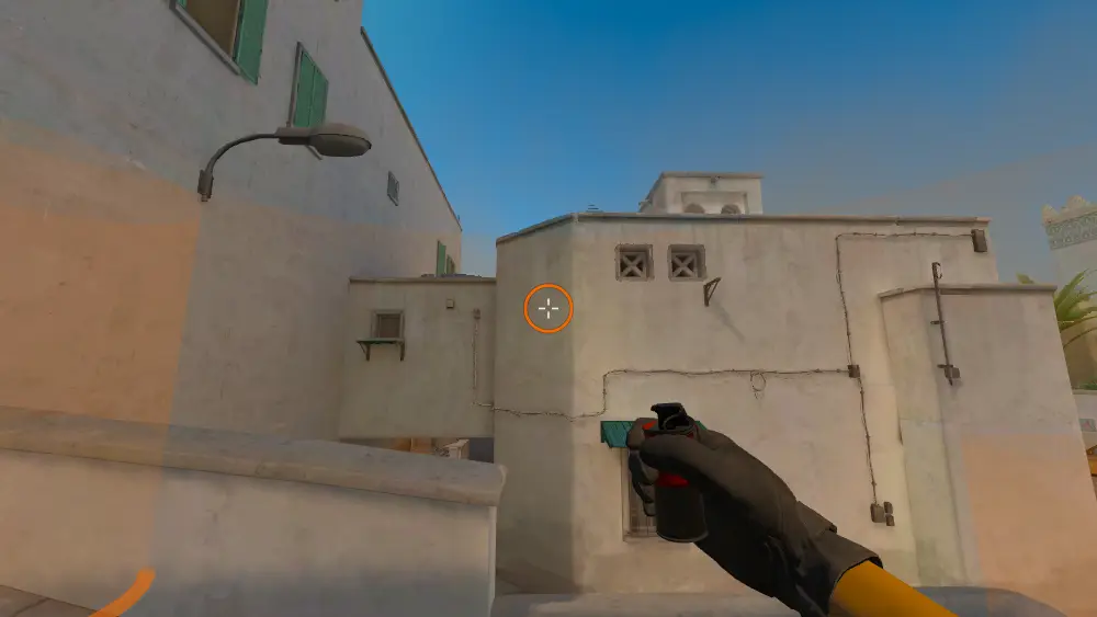 Standing on the Dust2 spot on Dust2, the aim mark on the point this smoke is thrown at.