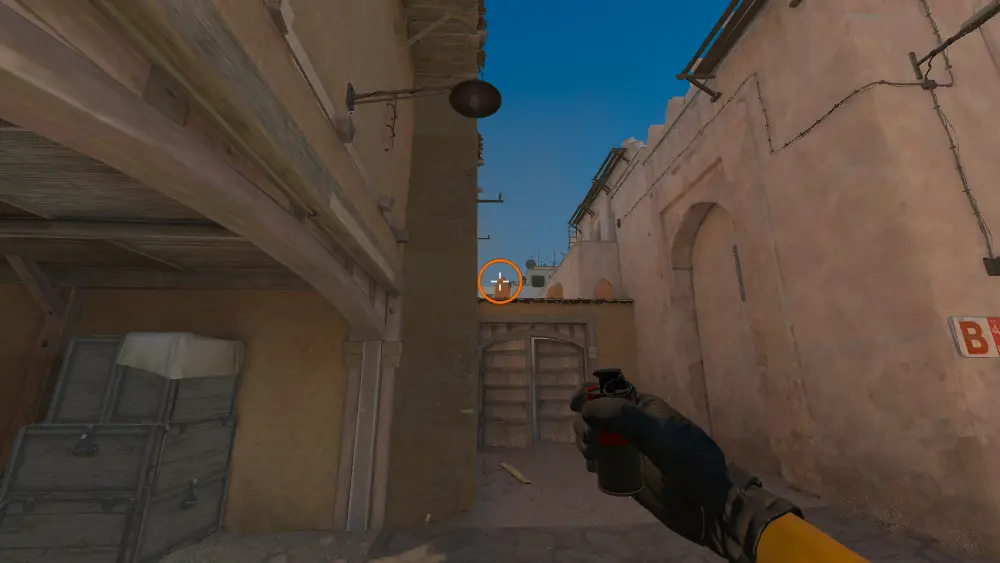 Standing on the CT Mid spot on Dust2, the aim mark on the point this smoke is thrown at.