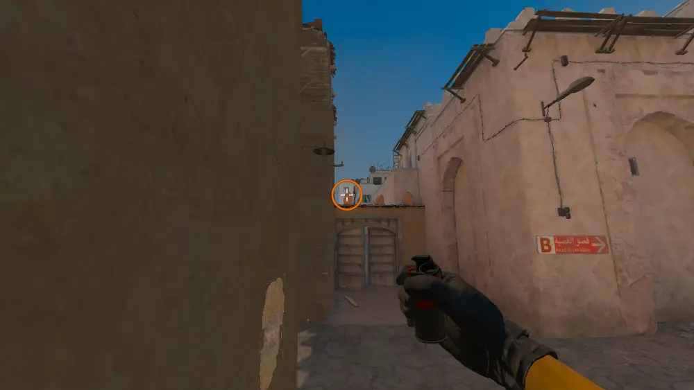 Standing on the CT Mid spot on Dust2, the aim mark on the point this smoke is thrown at.