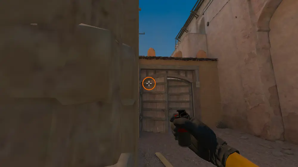 Standing on the CT Mid2 spot on Dust2, the aim mark on the point this smoke is thrown at.