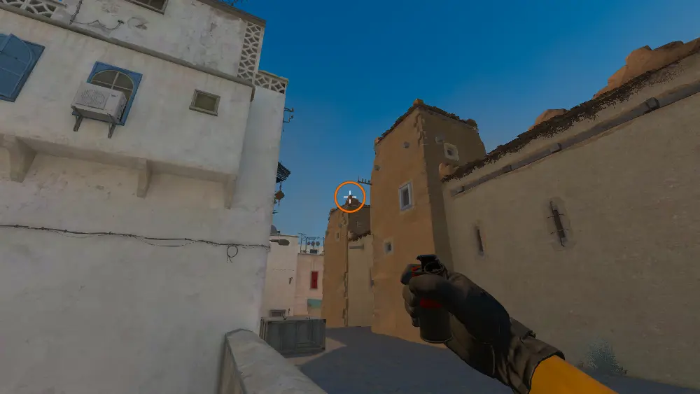 Standing on the Short Boost spot on Dust2, the aim mark on the point this smoke is thrown at.