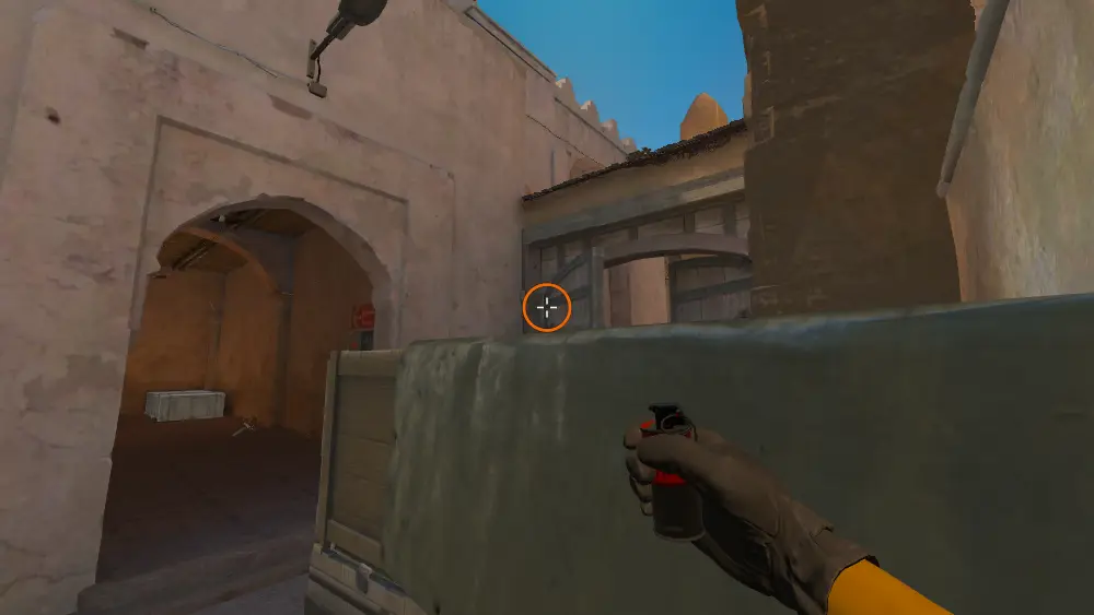 Standing on the Dust2 spot on Dust2, the aim mark on the point this smoke is thrown at.