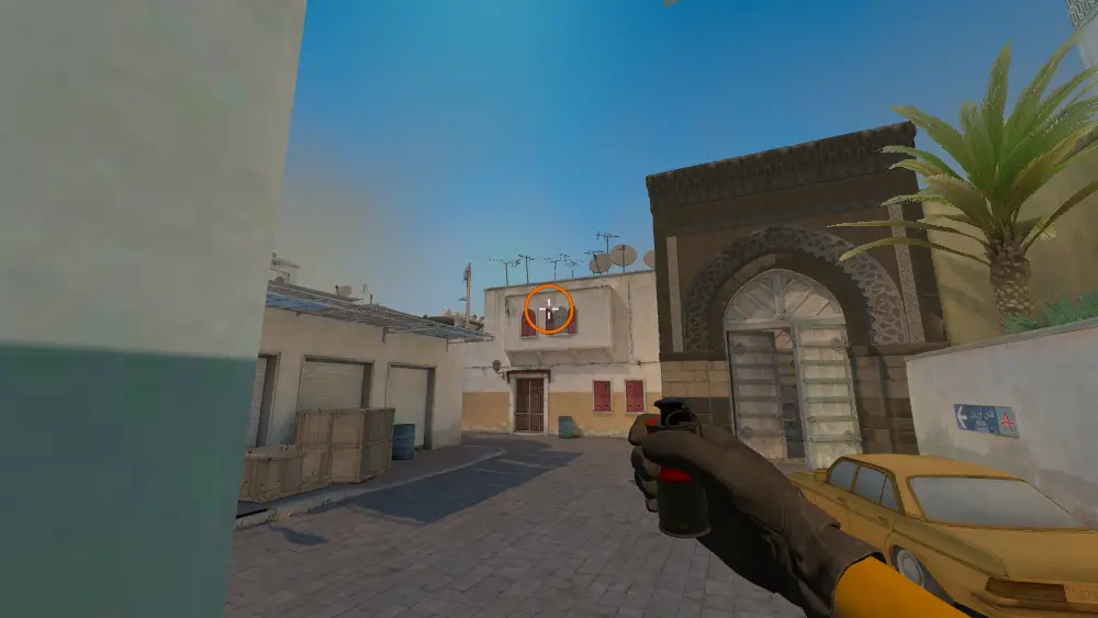 Standing on the Outside Long spot on Dust2, the aim mark on the point this smoke is thrown at.
