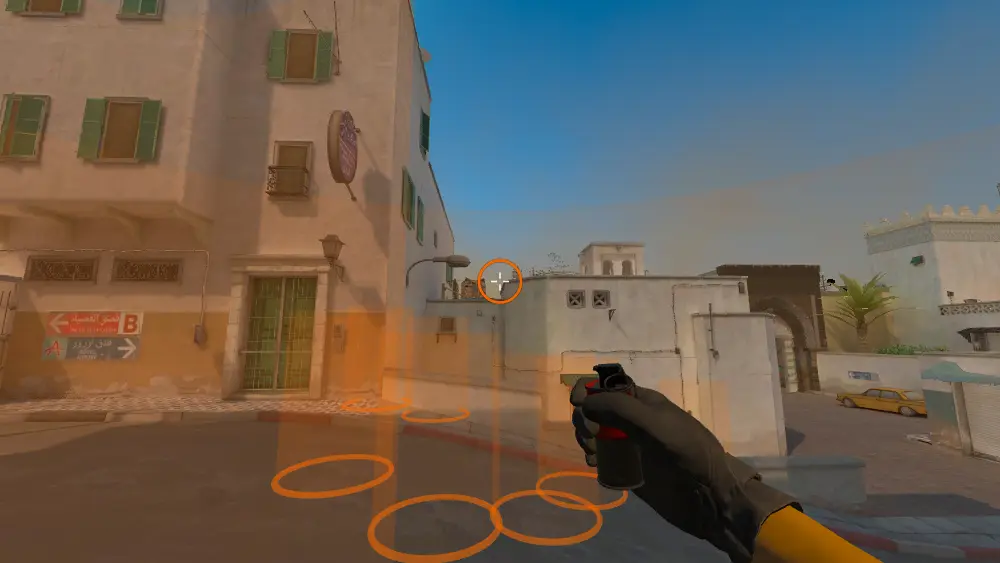 Standing on the T Spawn Railing spot on Dust2, the aim mark on the point this smoke is thrown at.