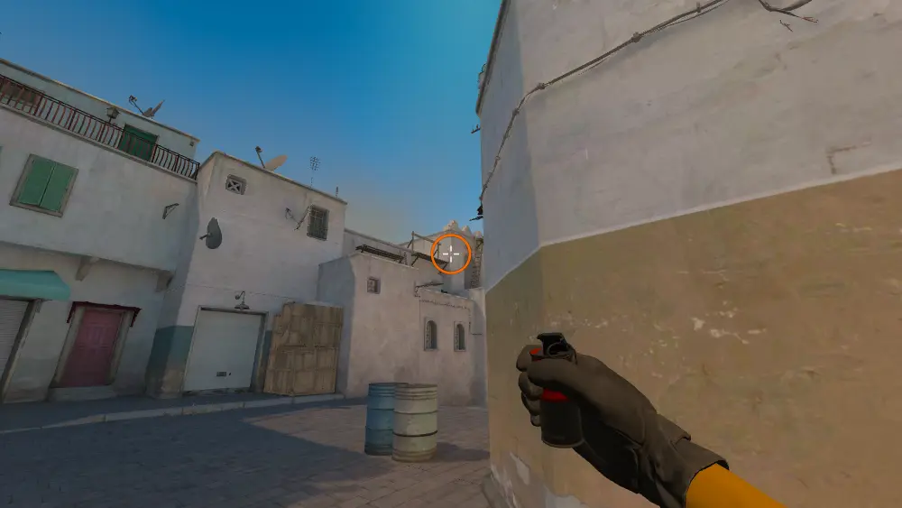 Standing on the Top Mid spot on Dust2, the aim mark on the point this smoke is thrown at.