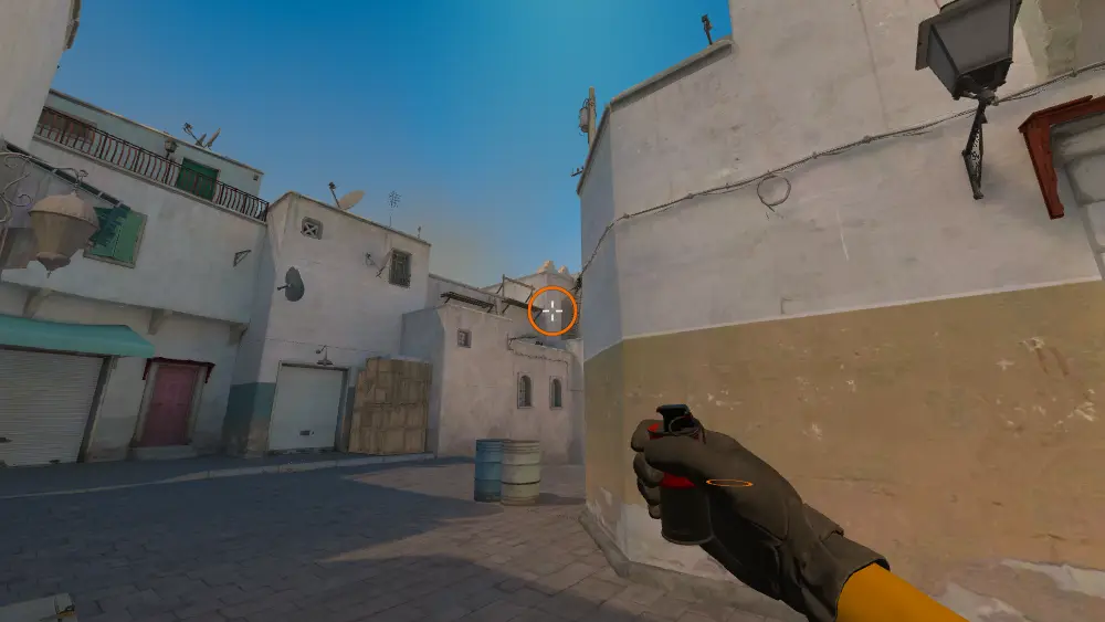 Standing on the Mid Barrels spot on Dust2, the aim mark on the point this smoke is thrown at.