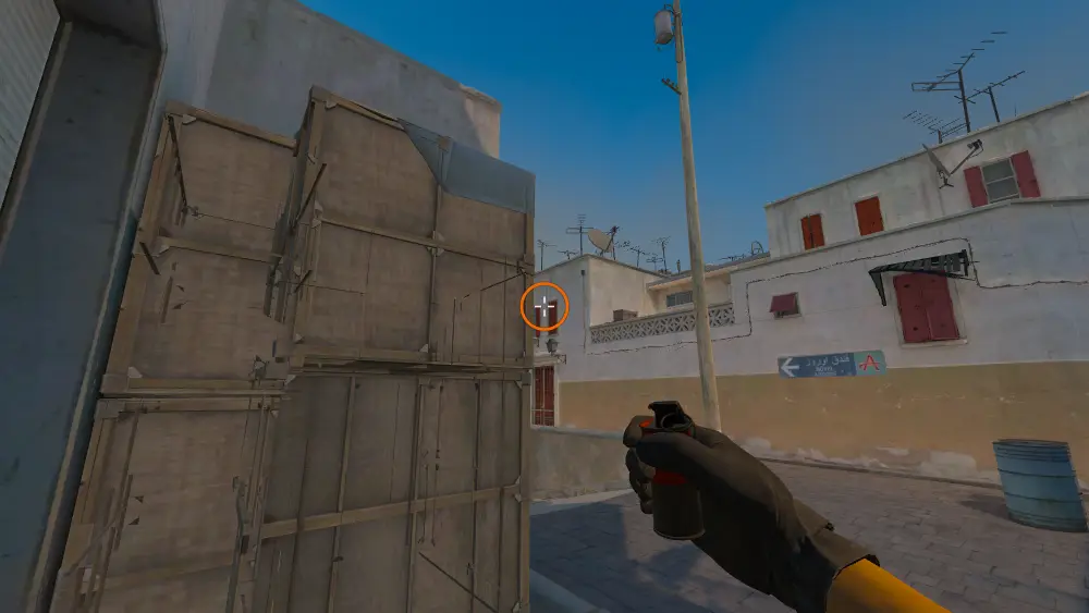 Standing on the Right Side Mid spot on Dust2, the aim mark on the point this smoke is thrown at.