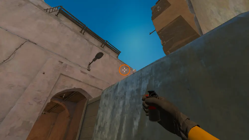 Standing on the Dust2 spot on Dust2, the aim mark on the point this smoke is thrown at.