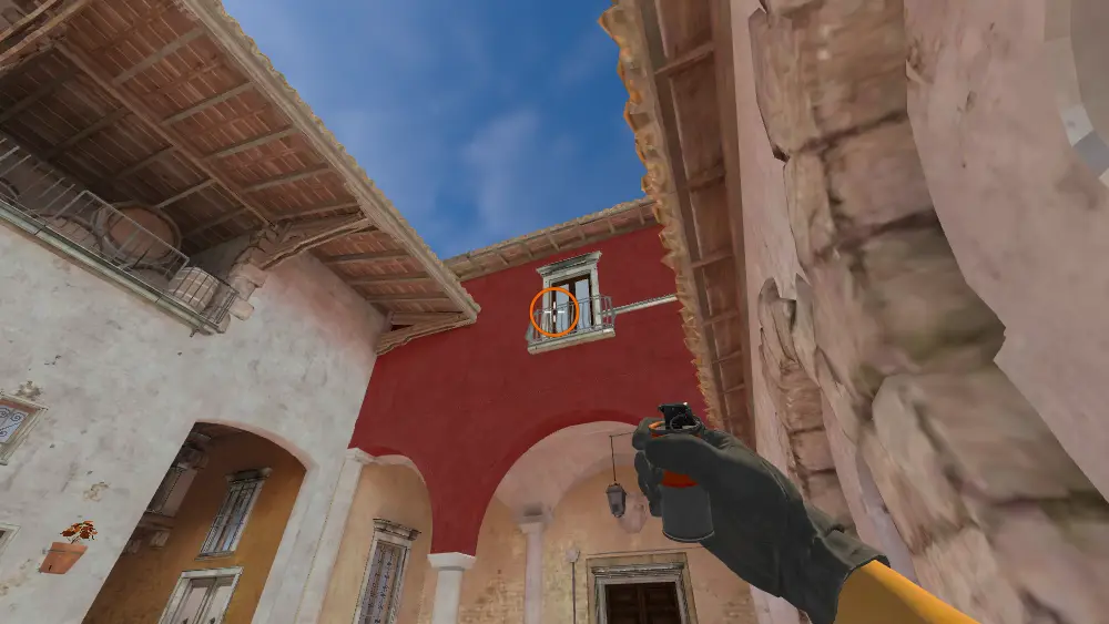 Standing on the CT Spawn spot on Inferno, the aim mark on the point this smoke is thrown at.