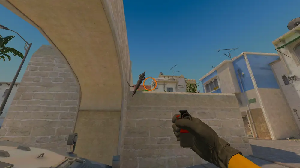 Standing on the CT Spawn spot on Mirage, the aim mark on the point this smoke is thrown at.