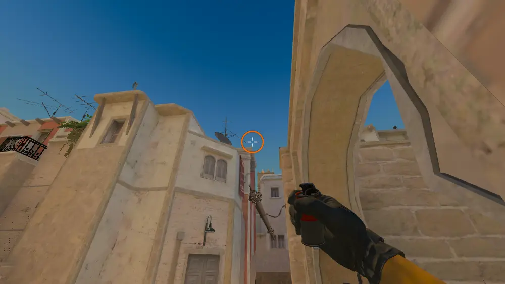 Standing on the Side Alley Rush spot on Mirage, the aim mark on the point this smoke is thrown at.