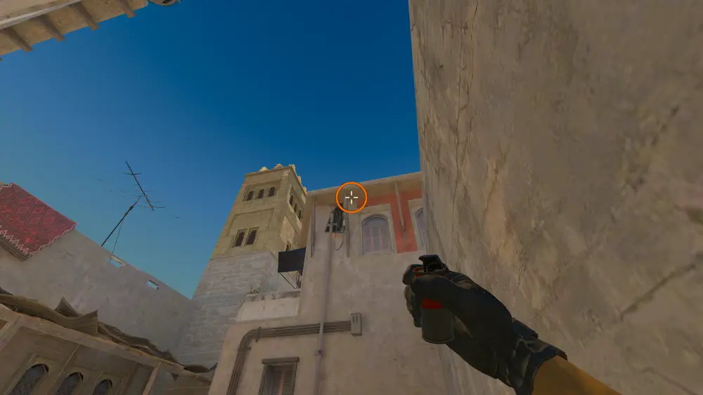 Standing on the Back Alley spot on Mirage, the aim mark on the point this smoke is thrown at.