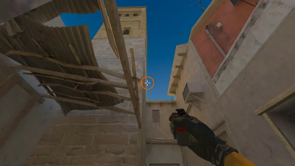 Standing on the Back Alley spot on Mirage, the aim mark on the point this smoke is thrown at.