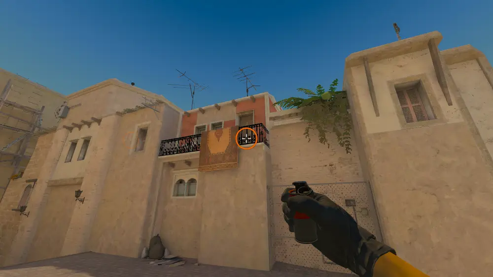 Standing on the T Spawn spot on Mirage, the aim mark on the point this smoke is thrown at.