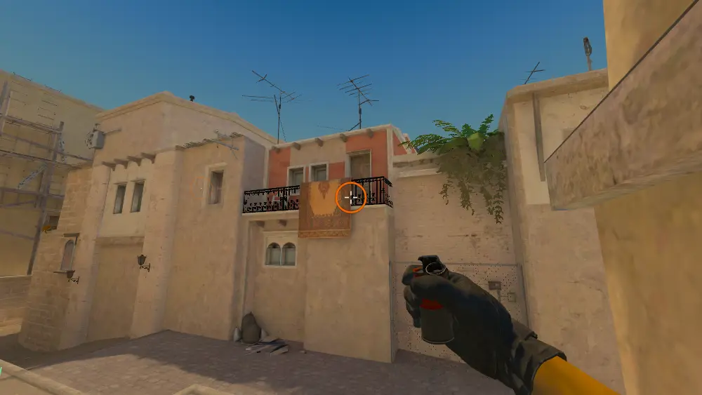 Standing on the T Spawn spot on Mirage, the aim mark on the point this smoke is thrown at.