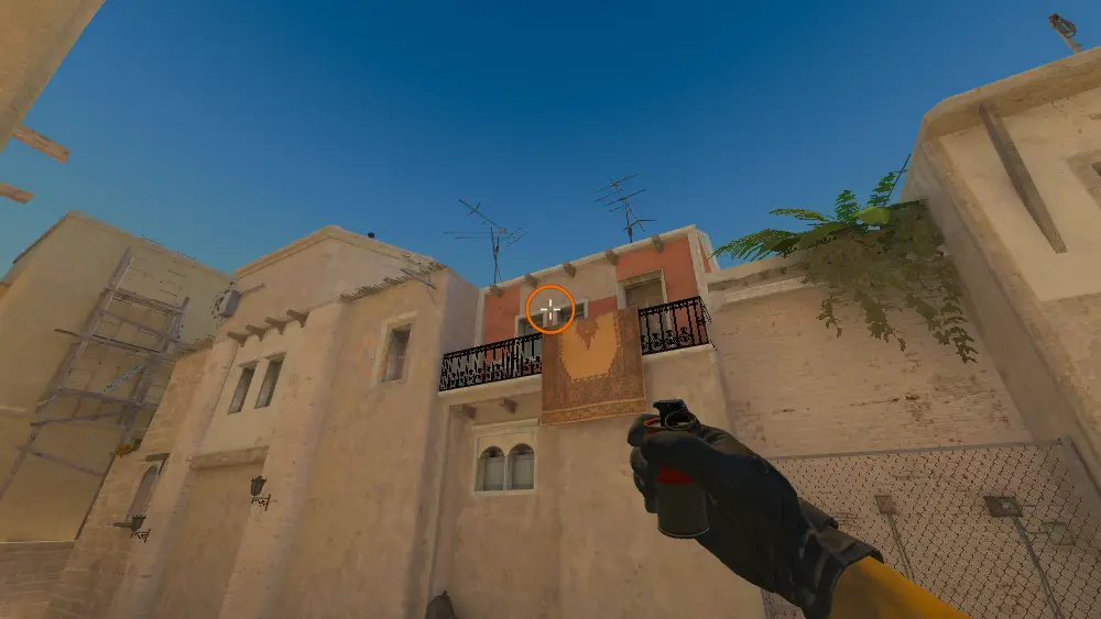 Standing on the T Spawn spot on Mirage, the aim mark on the point this smoke is thrown at.