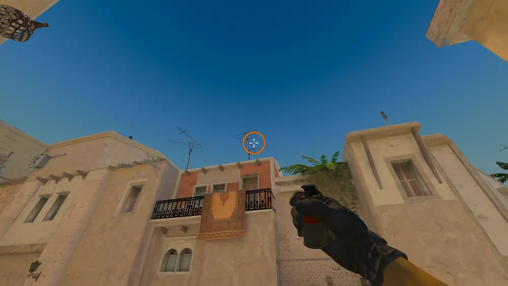 Standing on the T Spawn spot on Mirage, the aim mark on the point this smoke is thrown at.