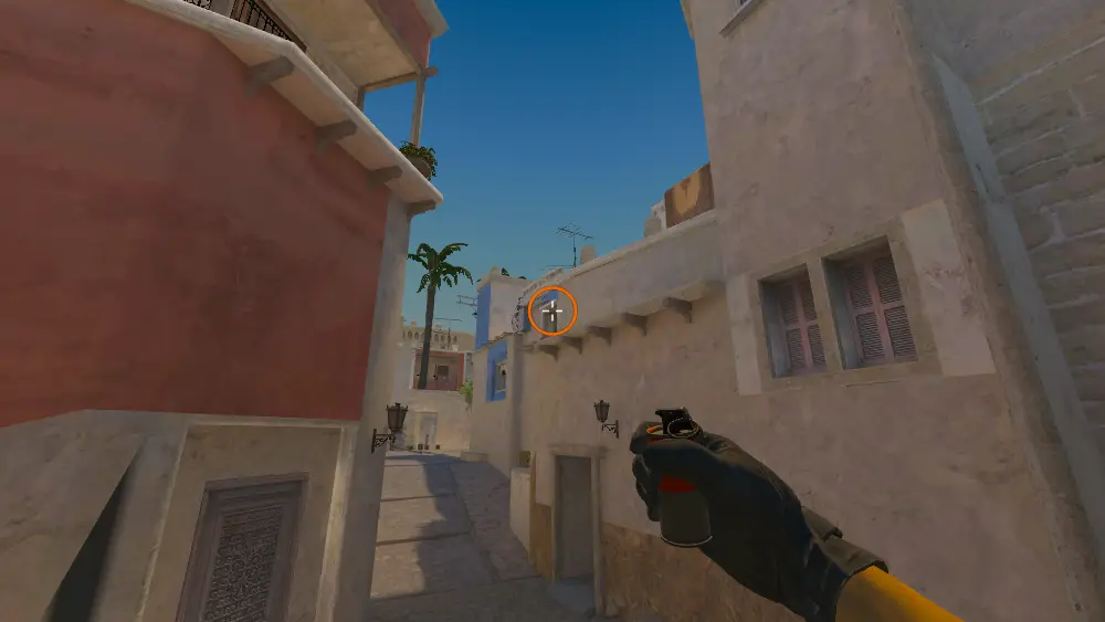 Standing on the Side Alley2 spot on Mirage, the aim mark on the point this smoke is thrown at.