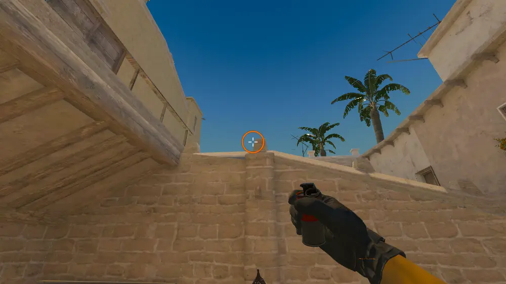 Standing on the T Roof spot on Mirage, the aim mark on the point this smoke is thrown at.