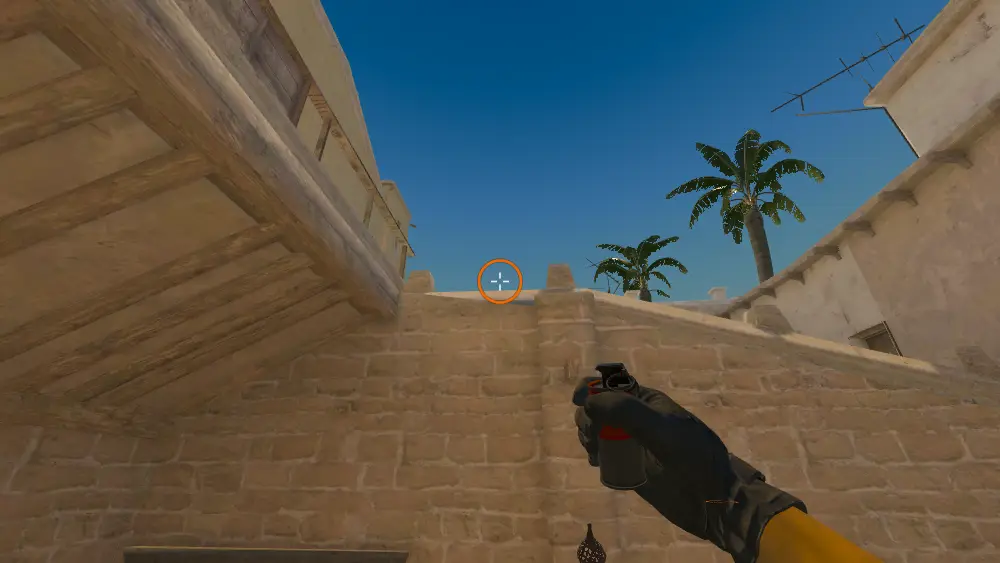 Standing on the T Roof spot on Mirage, the aim mark on the point this smoke is thrown at.