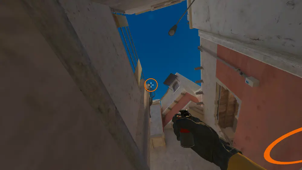 Standing on the Underpass spot on Mirage, the aim mark on the point this smoke is thrown at.