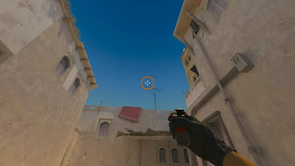 Standing on the Back Alley spot on Mirage, the aim mark on the point this smoke is thrown at.
