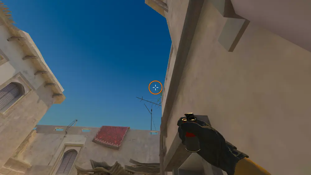 Standing on the Back Alley spot on Mirage, the aim mark on the point this smoke is thrown at.
