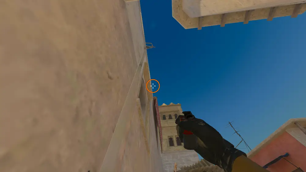 Standing on the Back Alley spot on Mirage, the aim mark on the point this smoke is thrown at.