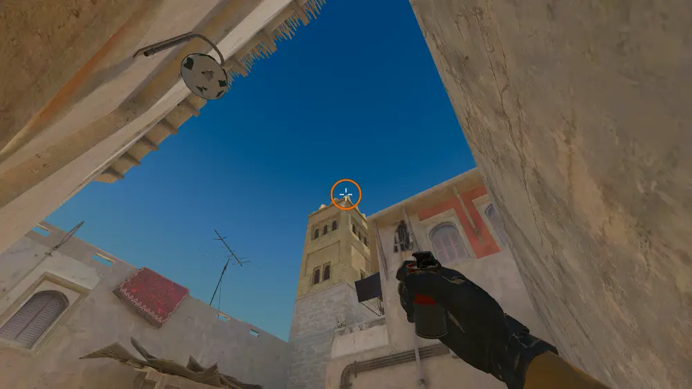 Standing on the Back Alley spot on Mirage, the aim mark on the point this smoke is thrown at.