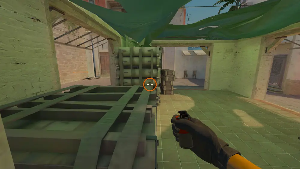 Standing on the Boost Boxes spot on Mirage, the aim mark on the point this molotov is thrown at.