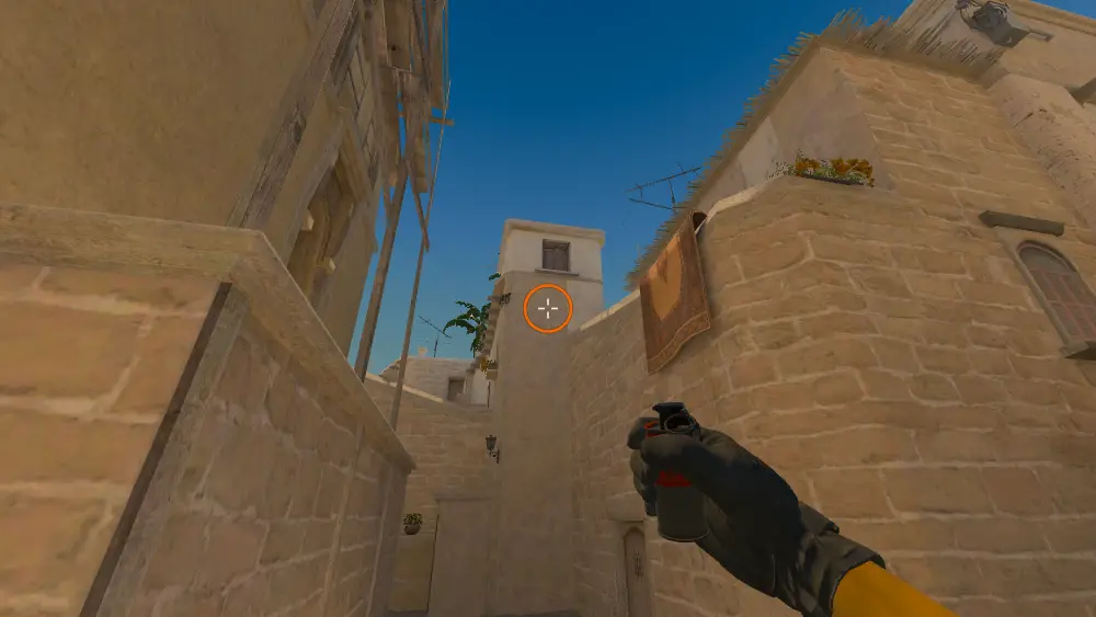 Standing on the T Roof spot on Mirage, the aim mark on the point this smoke is thrown at.