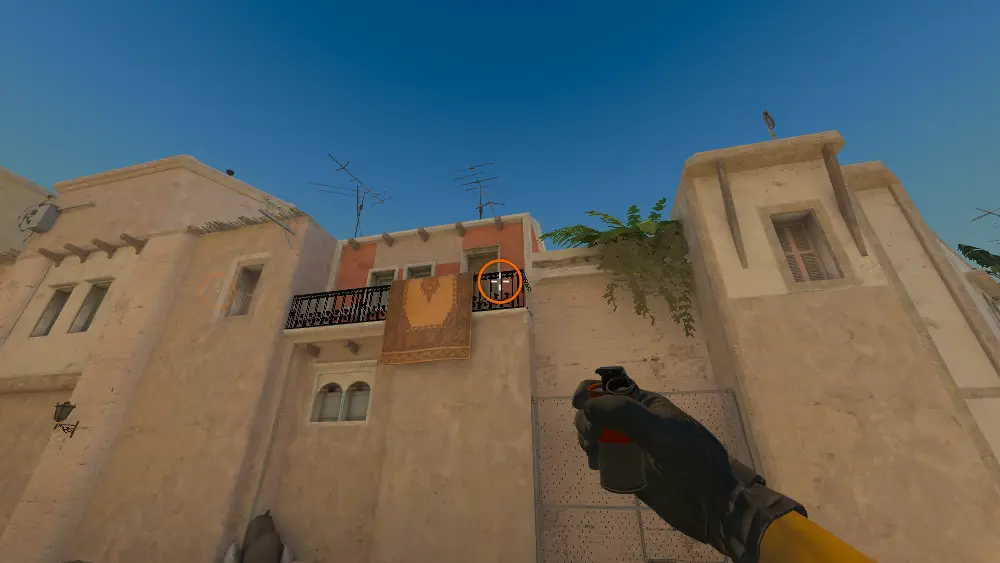 Standing on the T Spawn spot on Mirage, the aim mark on the point this smoke is thrown at.