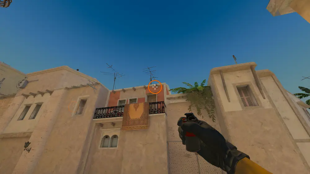 Standing on the T Spawn spot on Mirage, the aim mark on the point this smoke is thrown at.