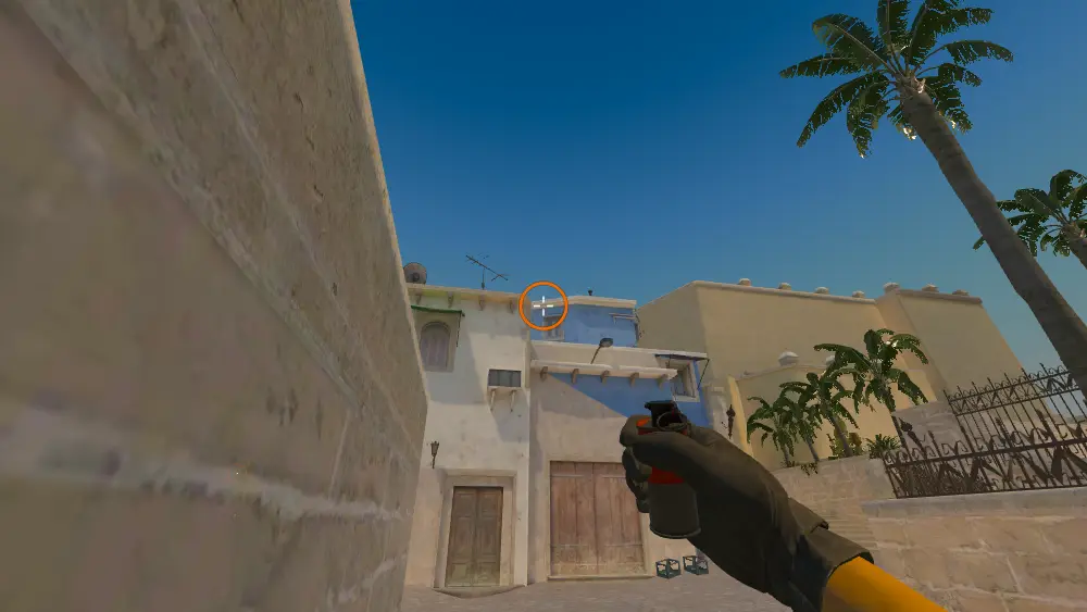 Standing on the CT Spawn spot on Mirage, the aim mark on the point this smoke is thrown at.
