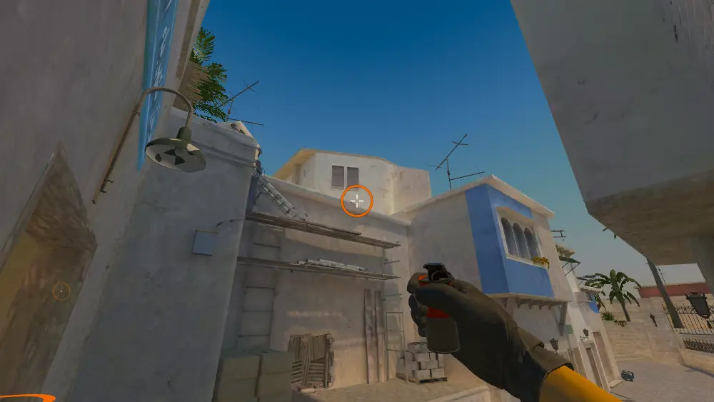 Standing on the Outside Market spot on Mirage, the aim mark on the point this smoke is thrown at.
