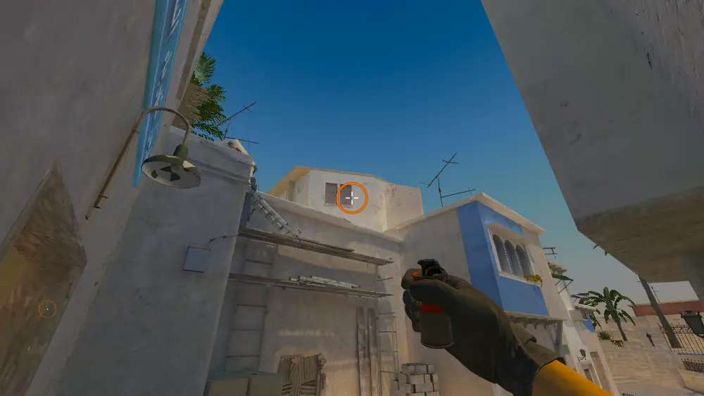 Standing on the Market spot on Mirage, the aim mark on the point this smoke is thrown at.